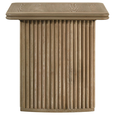 Side angle of coffee table highlighting curved pedestal base