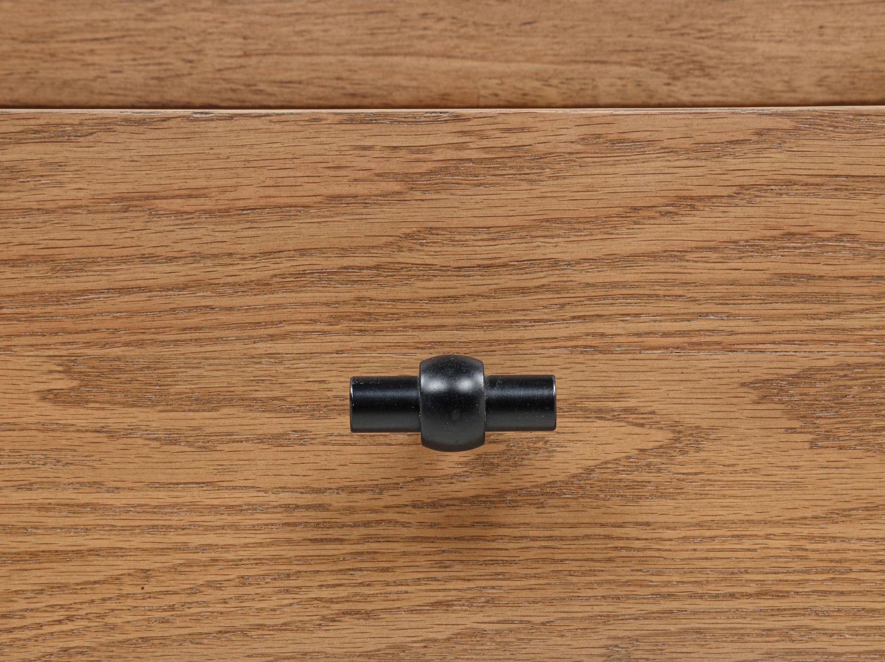 Open shelf view of Beasley coffee table in golden oak