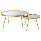 Round end table with gold frame and mirrored surface
