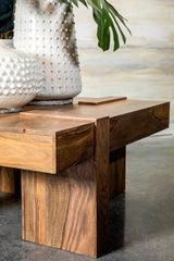 Low profile Skeet coffee table surrounded by living room furniture