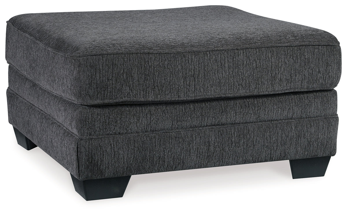 room setting view of Tracling Slate 3-Piece Sectional Sofa with Ottoman