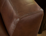Material swatch showing Canyon top grain leather and faux leather