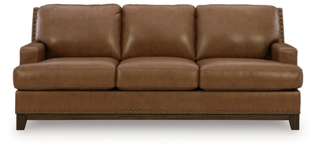 Close-up of Saonara sofa jumbo stitching and leather upholstery