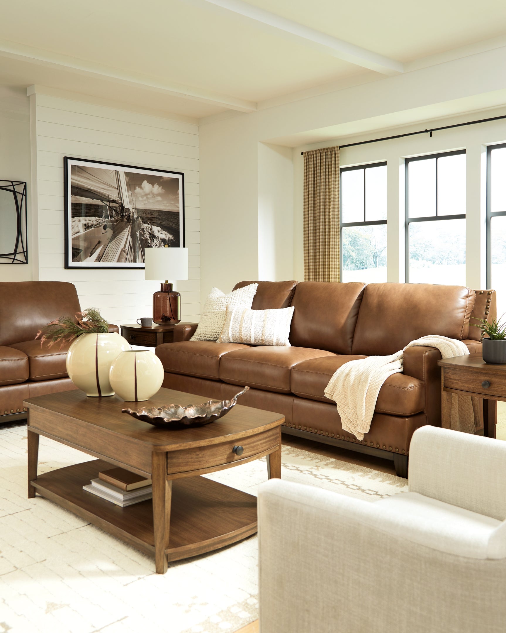 Side angled view of Saonara Amber Sofa and Loveseat