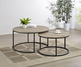 Small round nesting coffee table with metal base and distressed pine top