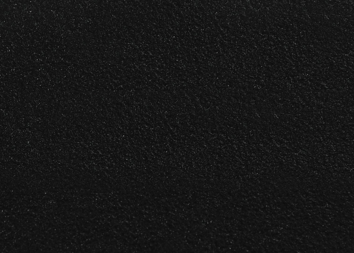 Top view of Hadi round end table showing three drawers with felt lining