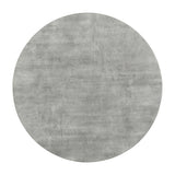Hadi Round Coffee Table shown in loft-style living room