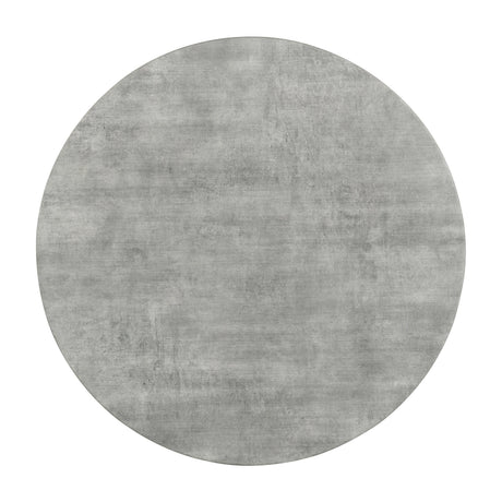 Hadi Round Coffee Table shown in loft-style living room
