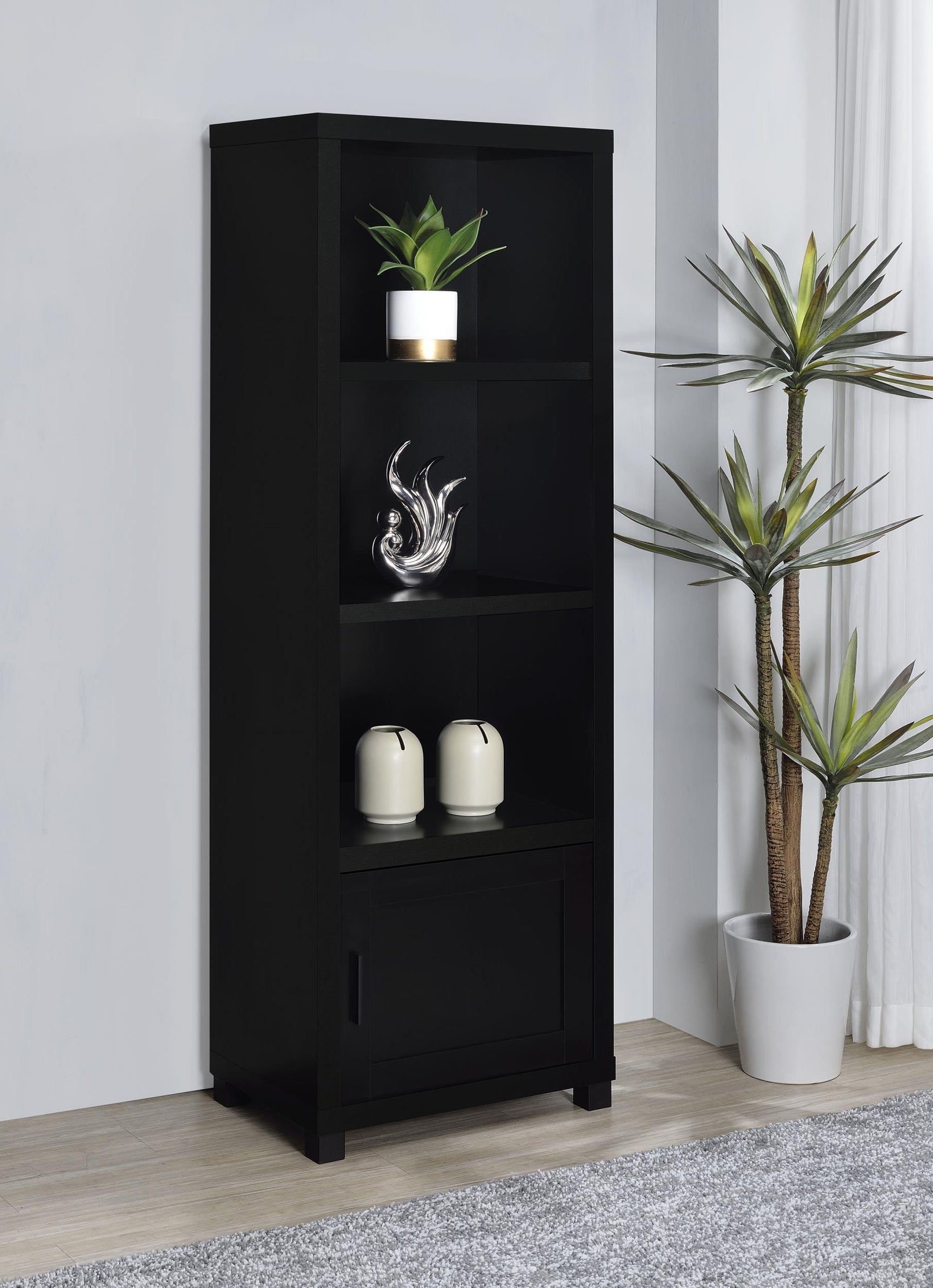 Media tower with open shelves and concealed cabinet in black