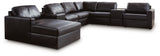 Detailed view of sectional sofa hardware and leather