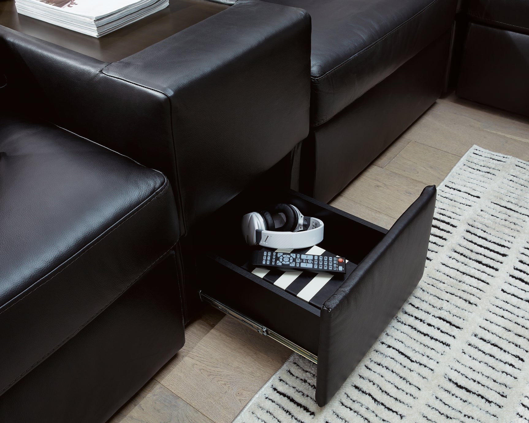Room view showing Modmax II sectional with chaise and storage console