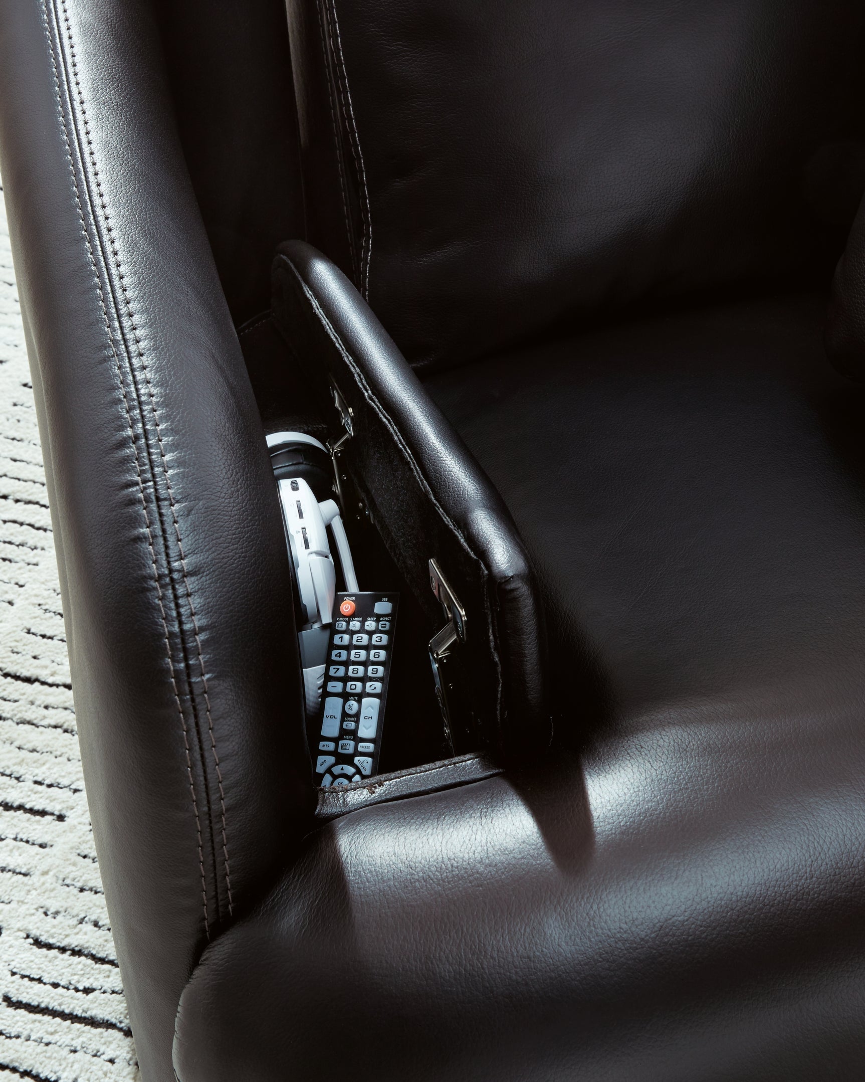 side view of Modmax II Black Leather Swivel Glider Recliner recliner