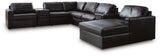 Side view of Modmax II black leather sectional with chaise and audio consoles