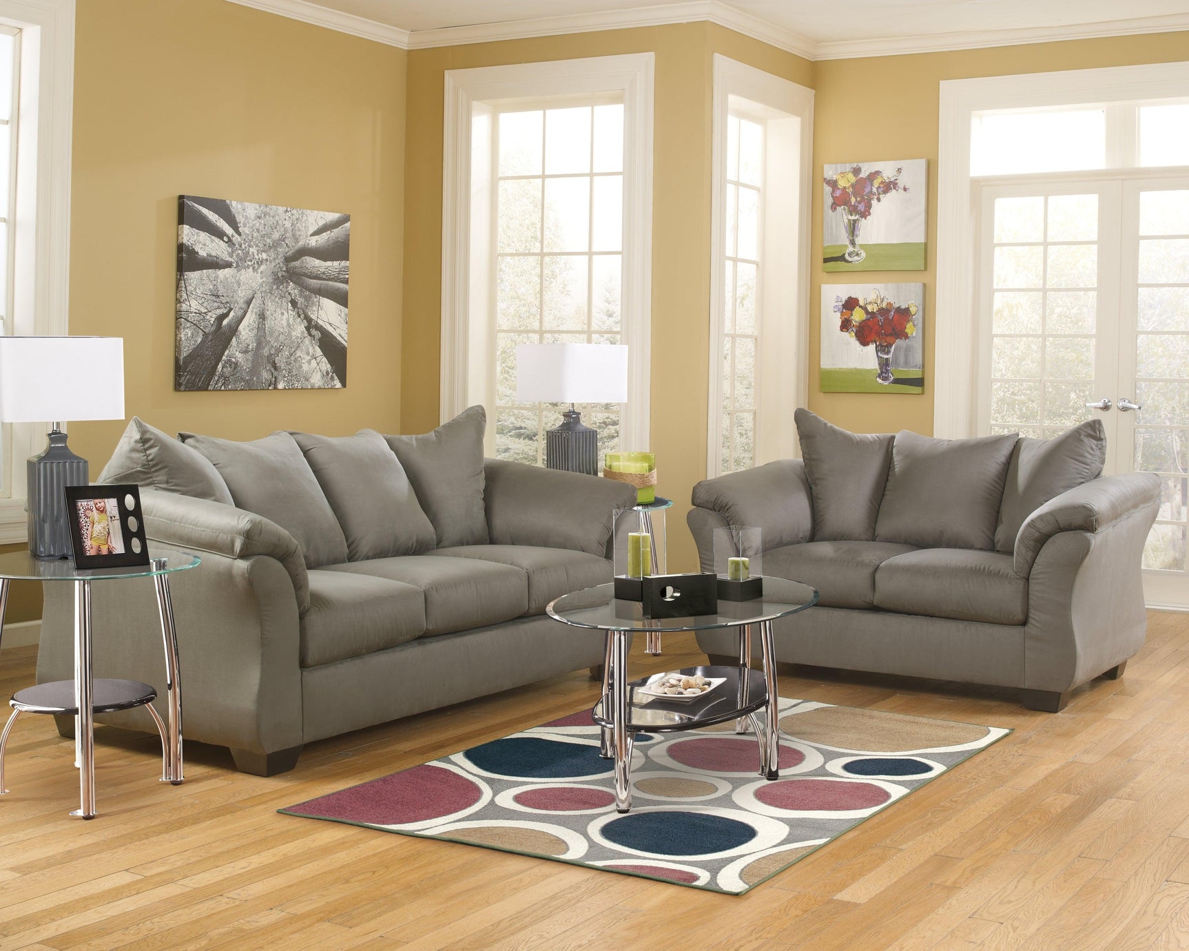 Darcy Cobblestone Microfiber Loveseat wood-finished leg detail