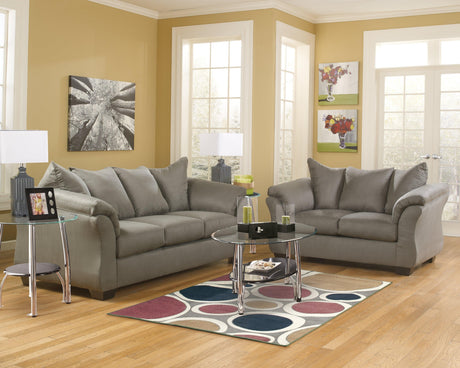 Darcy Cobblestone Microfiber Loveseat wood-finished leg detail
