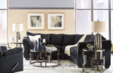 Darcy Black Microfiber Recliner reclined with pillow