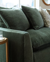 Room setting featuring Carriage View Jade Velvet 3-Piece Sectional Sofa
