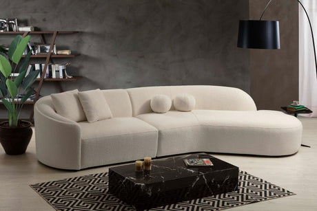 Detail view of ivory boucle textured fabric on Ava Sectional