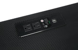 Wireless charging pad on desk surface