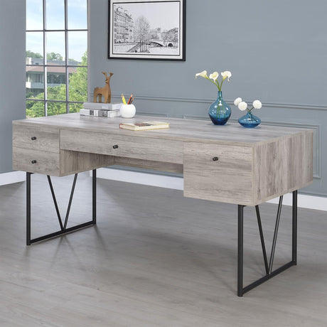 Analiese Grey Driftwood 4-drawer writing desk front angle