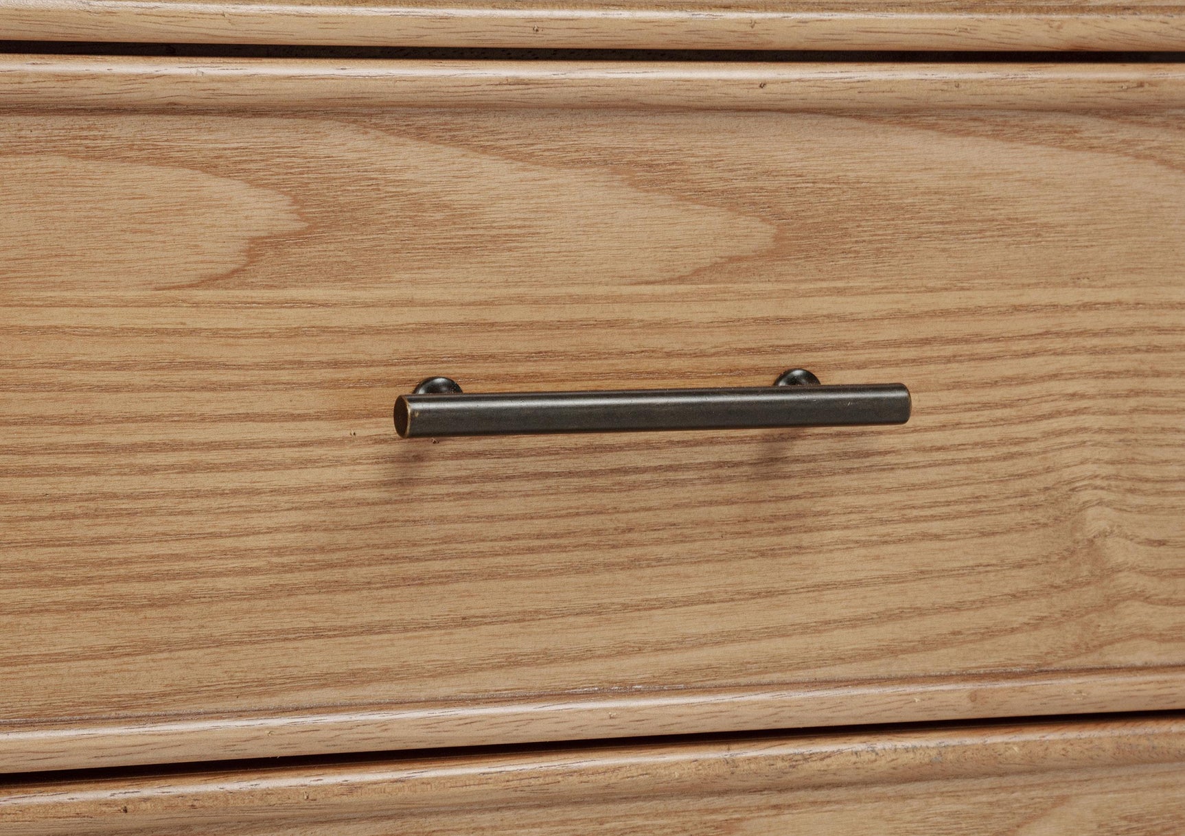 Under-desk view highlighting power outlet and cable management