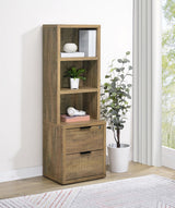 Bookcase close-up showing three shelves and lockable drawer