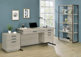 Side angle showing the metal sled base of Loomis office desk