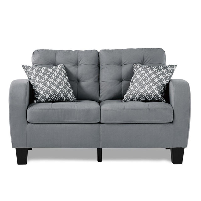 Sinclair Gray Loveseat front view showing tufted gray fabric and wood frame