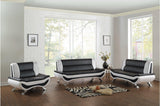 Side view of Veloce black and white faux leather tufted sofa