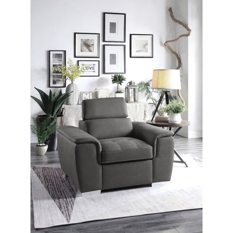 Chair with pop-up ottoman opened