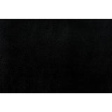 Close-up detail of black faux leather upholstery on Barrington sectional