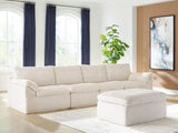 Side angle view of Fannin Ivory Sectional and Ottoman