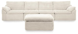 Side view of Fannin Ivory 4-Piece Sectional Sofa with Ottoman