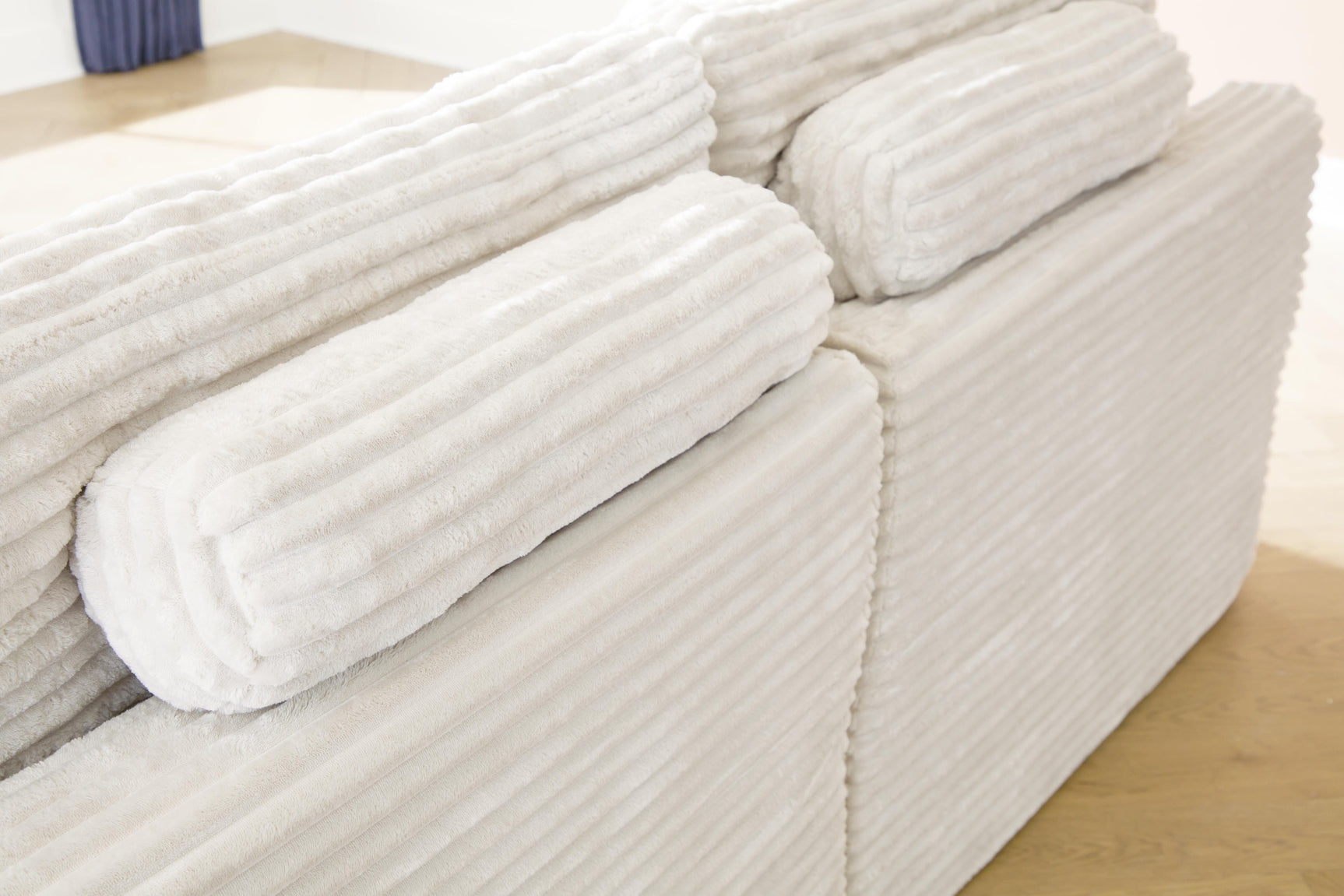 Rear view of Fannin Ivory Chenille corner sectional chair