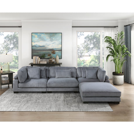 room setup featuring modular sectional sofa and ottoman
