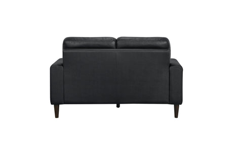 Chair detail with brown leather upholstery