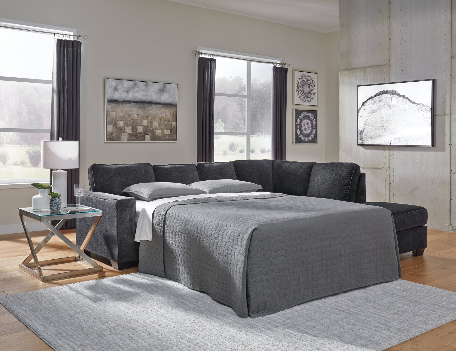 Room view showing the Altari Slate 2-Piece Sleeper Sectional with Ottoman