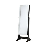 Close-up of black beveled cheval mirror and jewelry compartments