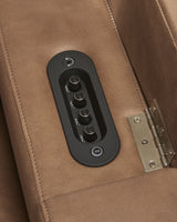 Control panel close-up on Lorrenton caramel faux leather power glider recliner