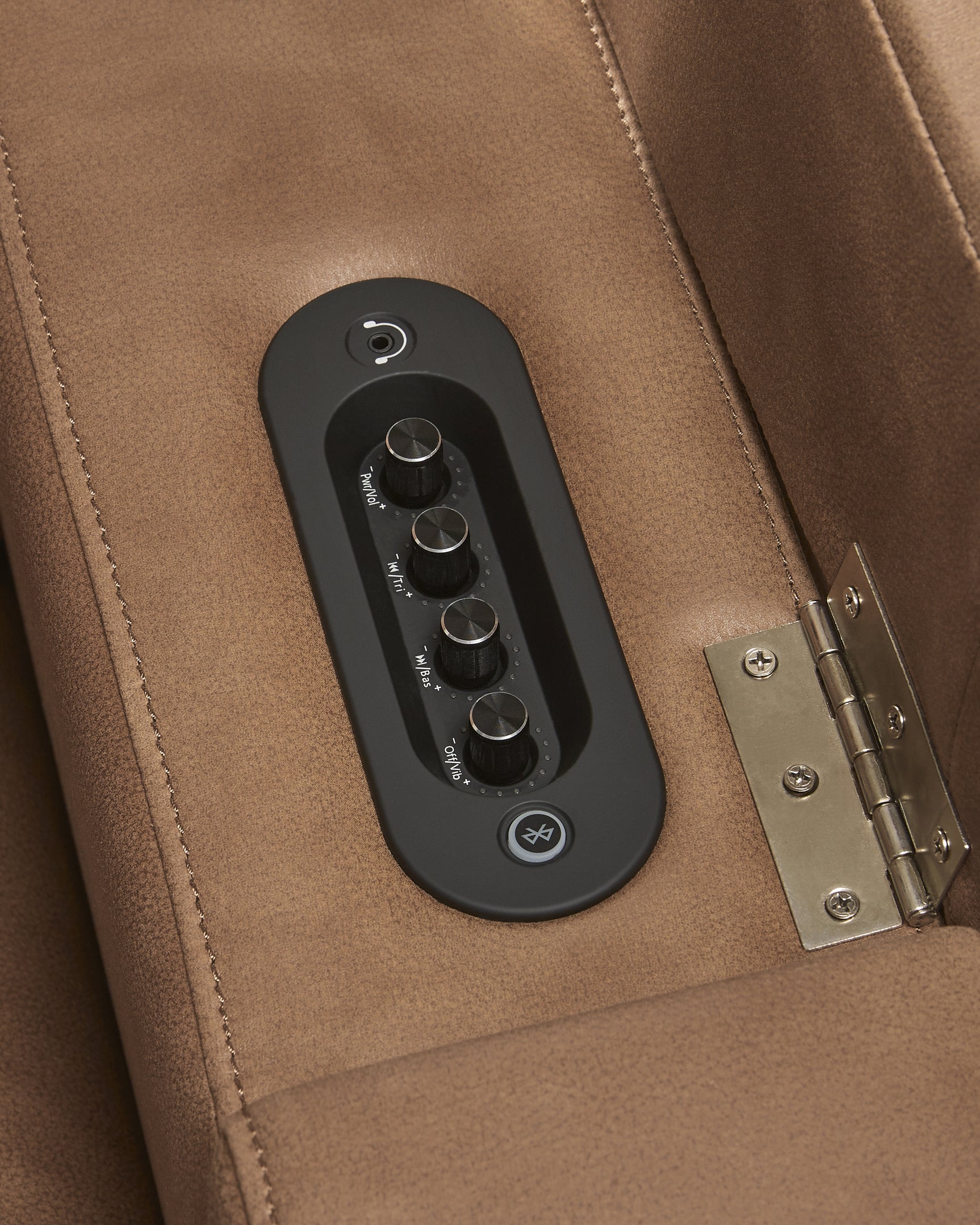 Control panel close-up on Lorrenton caramel faux leather power glider recliner