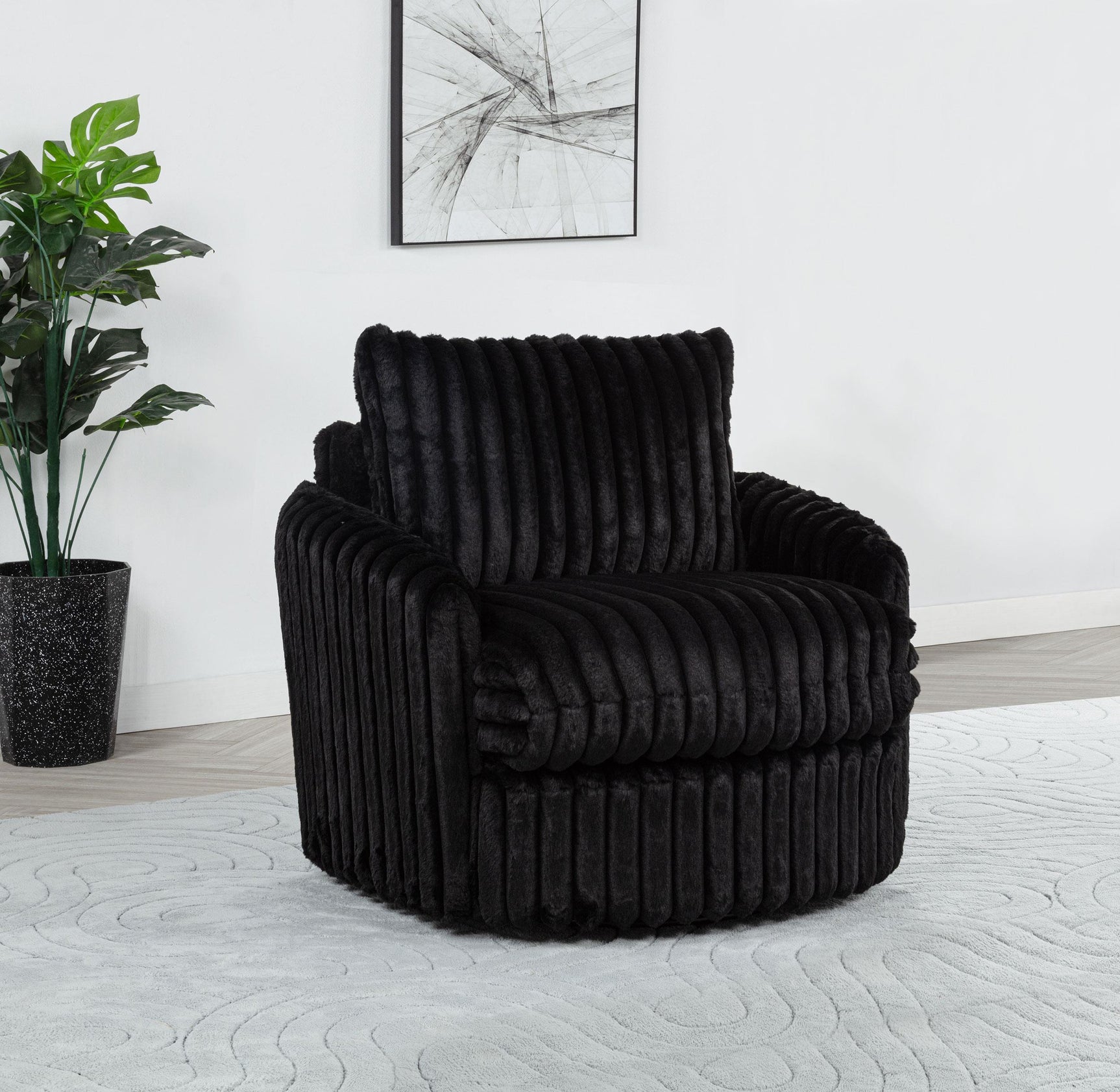 Sarco black corduroy swivel accent arm chair side view