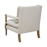 Angled view of Monaghan upholstered accent chair highlighting wood frame and casters