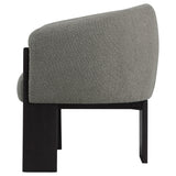 Valdez brown boucle upholstered barrel back accent chair close-up of fabric texture