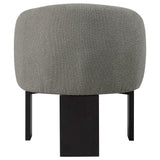 Valdez brown boucle upholstered barrel back accent chair seat and arm detail