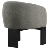 Valdez brown boucle upholstered accent chair showing plush foam cushions