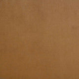 Thornton wingback chair side view showing velvet upholstery and wood legs
