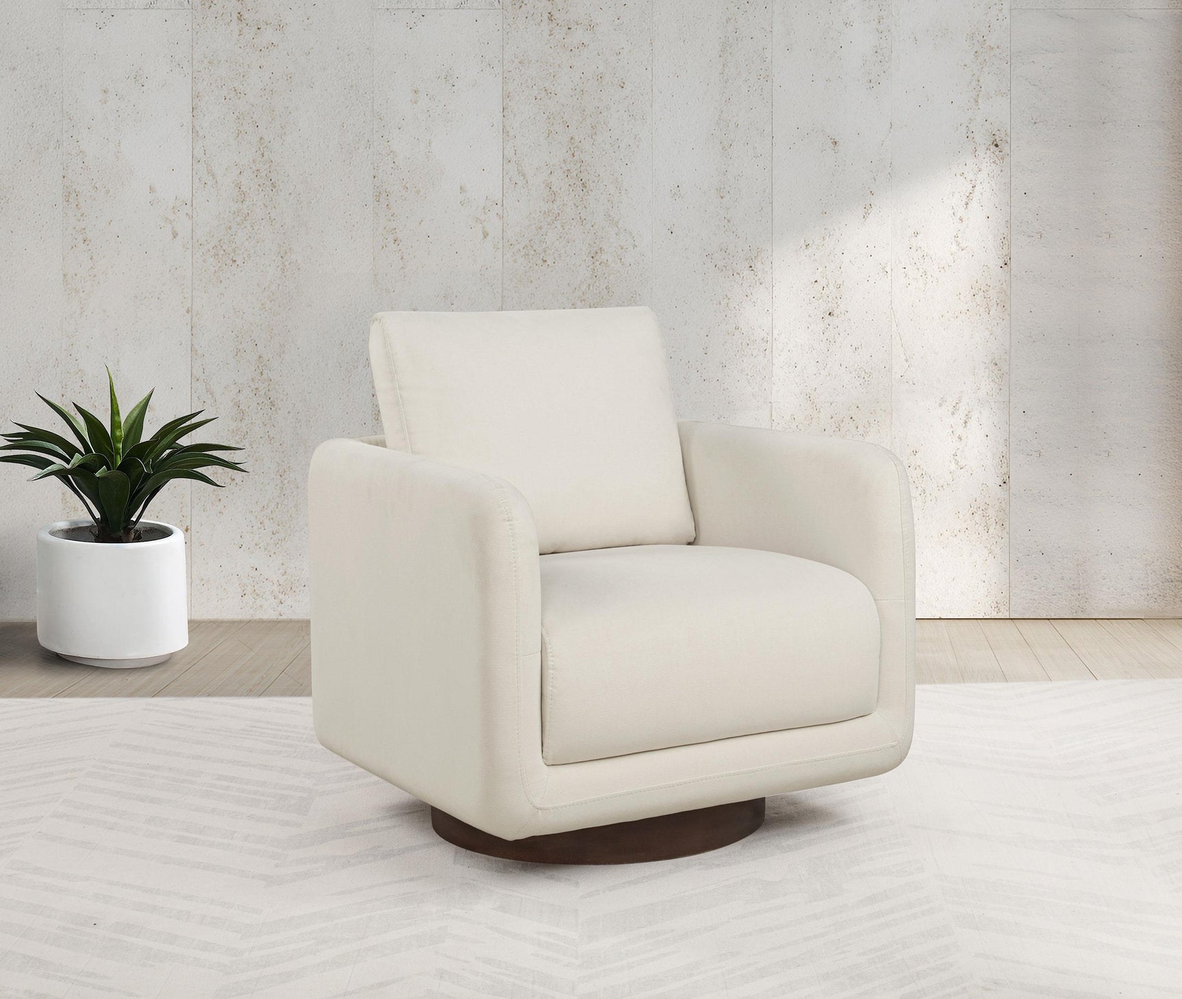 Swivel base detail of Iris ivory accent chair