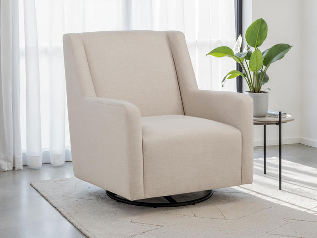 Sorrel swivel glider chair side view with latte fabric upholstery