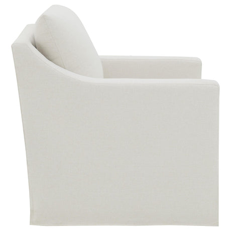 Overall chair silhouette in beige fabric