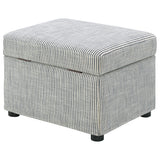 Grey storage ottoman in living room setting